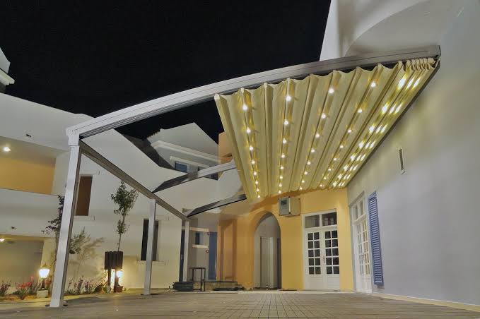 How Motorized Retractable Roof Systems are changing the game for Outdoor lounge and Clubs in Lagos Nigeria